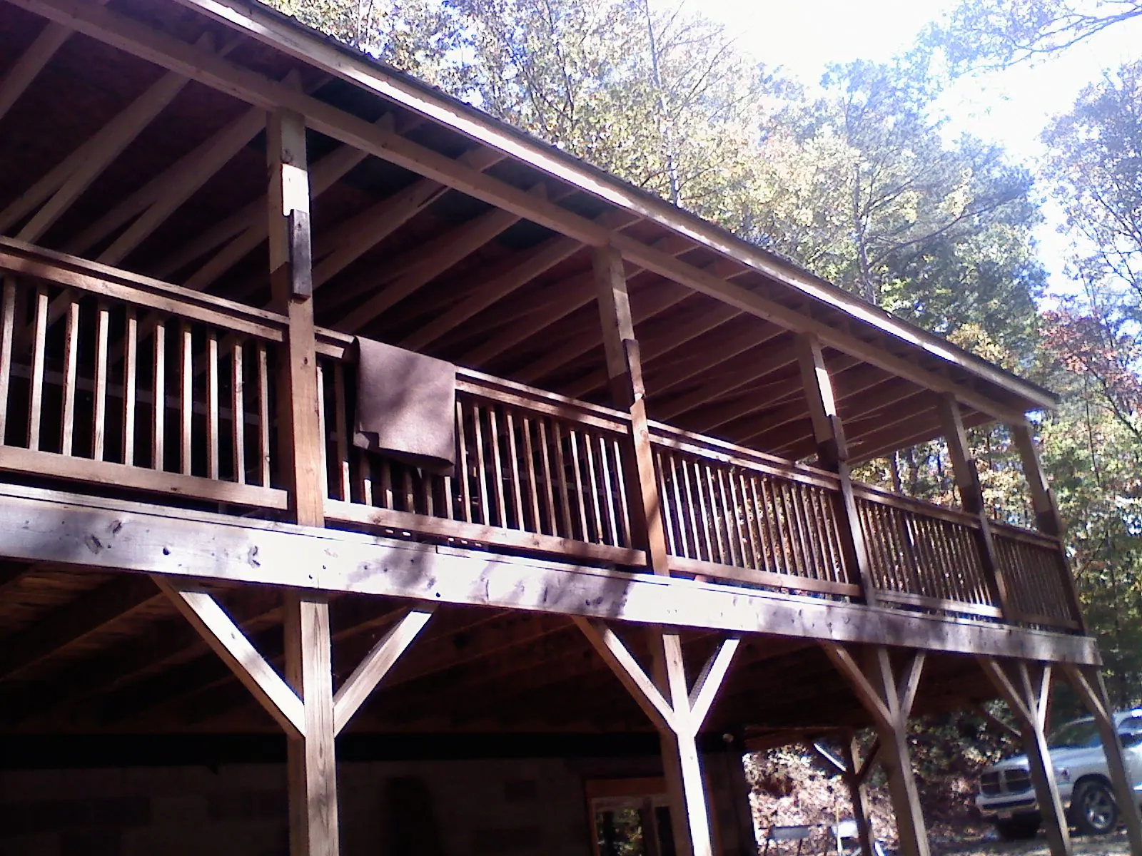 Timber framing under a new elevated porch and deck — Roof Leak Repair in Cache Junction by Roofing Brothers